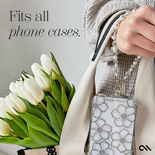 Pearl and crystal Case-Mate phone wristlet attached to floral phone case