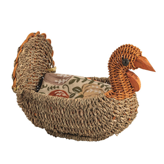 Woven seagrass turkey basket with raised tail feathers and coordinating fall floral cotton flour sack towel, two-piece Thanksgiving set.