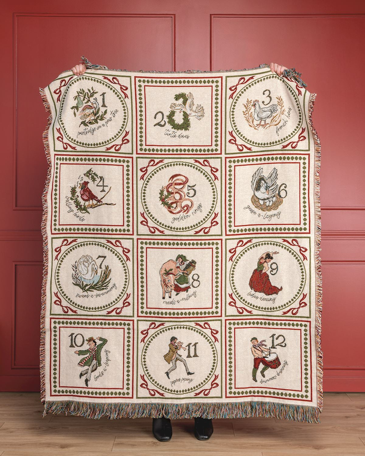 12 Days of Christmas woven jacquard blanket with vintage holiday illustrations and fringe trim