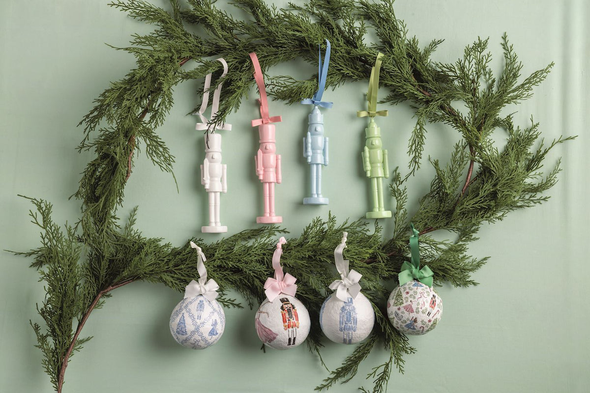 Mud Pie pastel lacquered nutcracker Christmas ornaments in white green light blue and pink