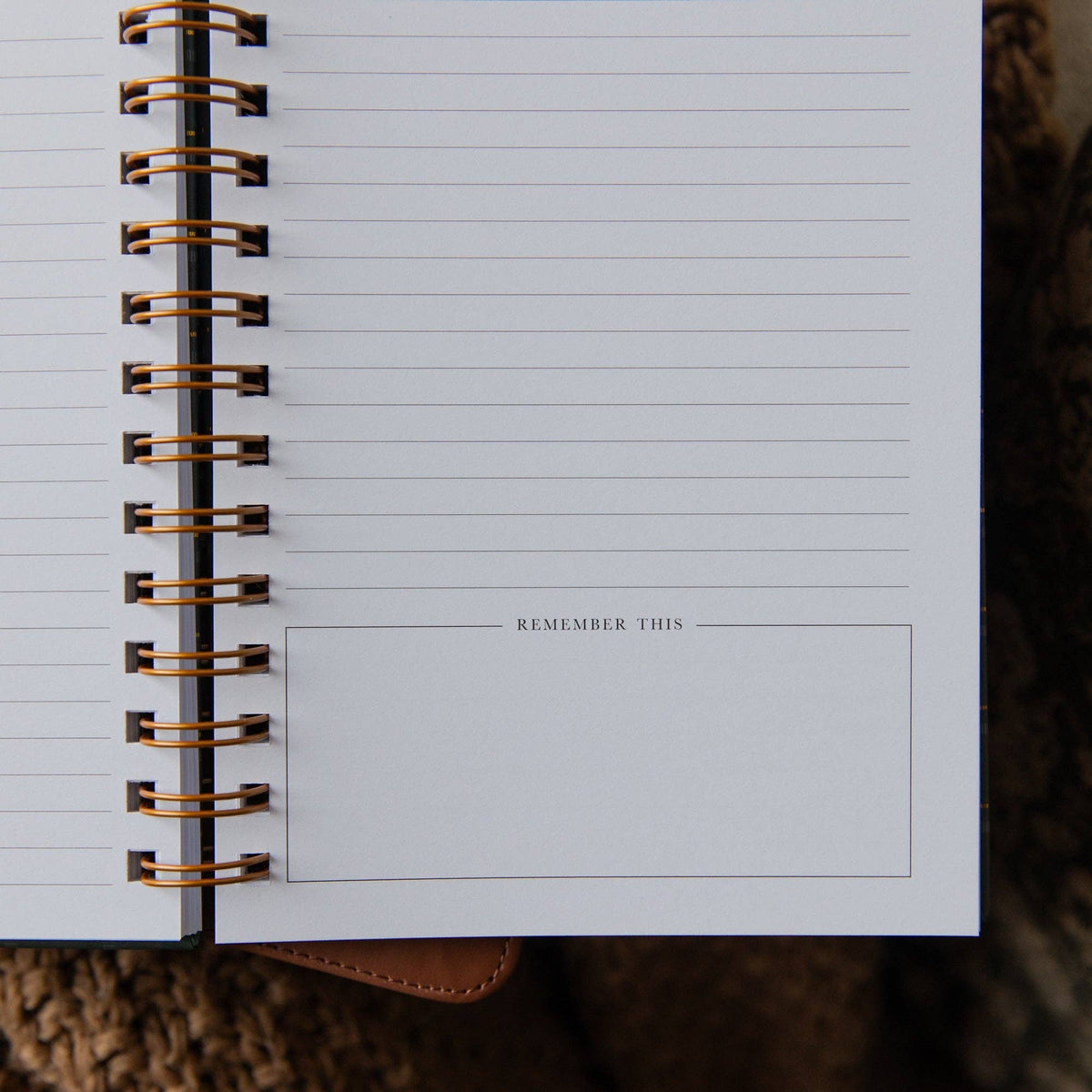 Interior of Christian sermon notes notebook featuring lined writing pages and a Remember This box for important sermon takeaways.