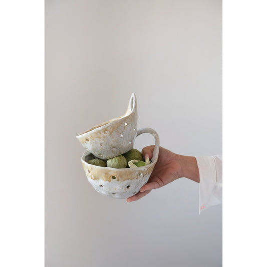 Beige stoneware berry colanders with handles and reactive glaze in small and large sizes