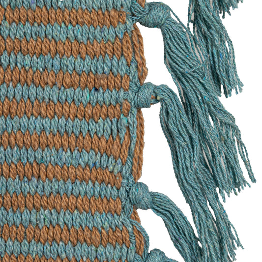 Close-up of Blue Ridge striped woven throw blanket with blue fringe and textured weave