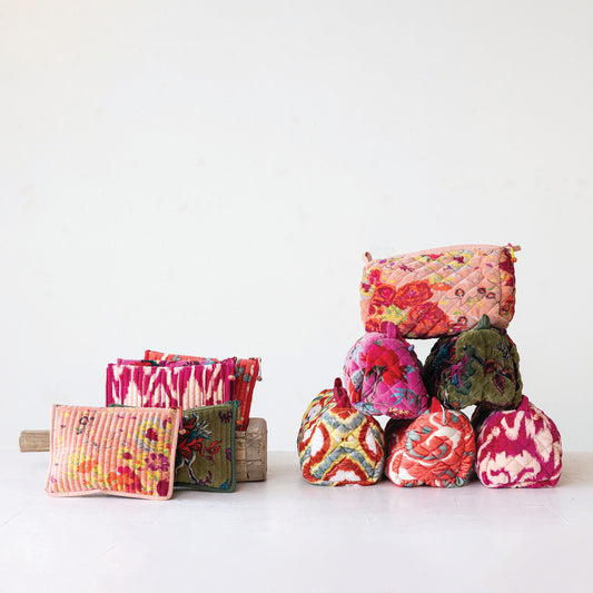 Six colorful quilted cotton velvet flat zip pouches in floral and geometric prints