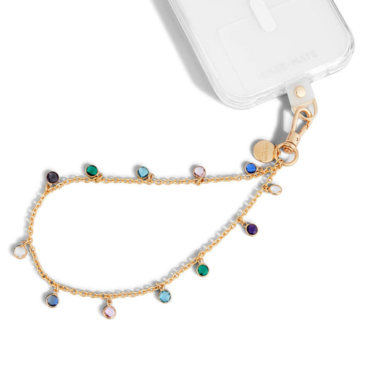 Kate Spade New York High Shine jeweled phone charm with gold chain and colorful stones