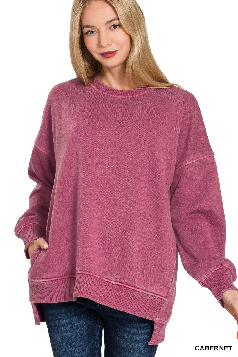 Front view of the Hadley women’s Cabernet Berry pigment-dyed fleece hi-low pullover with side pockets
