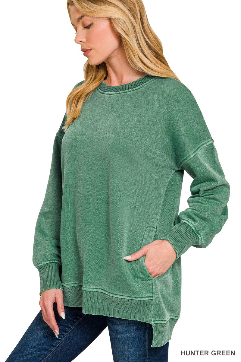Side view of the Hadley Vintage Hunter Green hi-low pullover showing its longer back hem