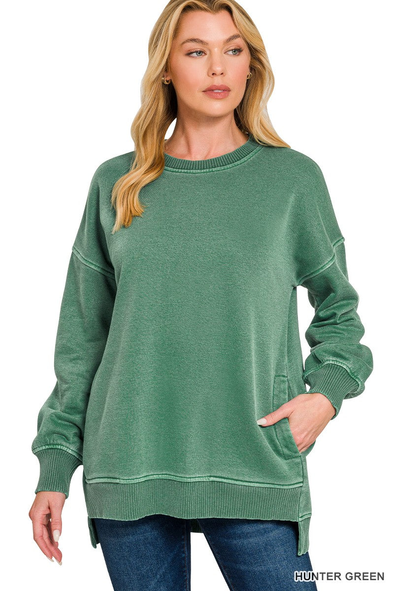 Front view of the Hadley women’s Vintage Hunter Green oversized fleece sweatshirt with pockets