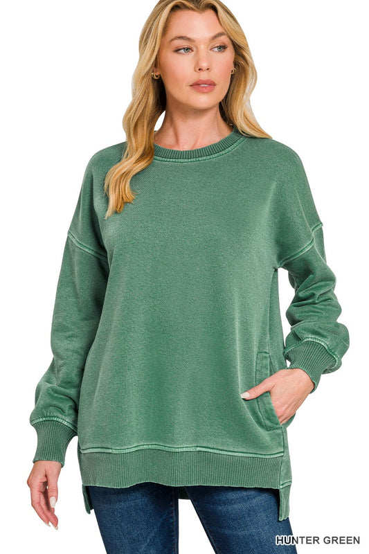 Front view of the Hadley women’s Vintage Hunter Green oversized fleece sweatshirt with pockets