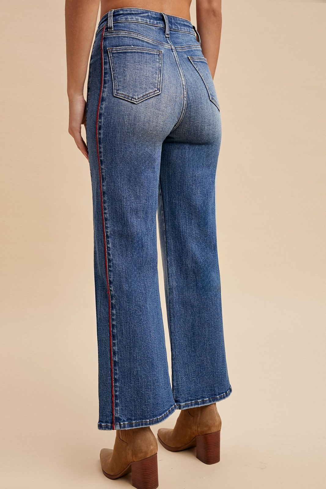 Back view of Tatum cropped wide leg jeans with red side stripe detail