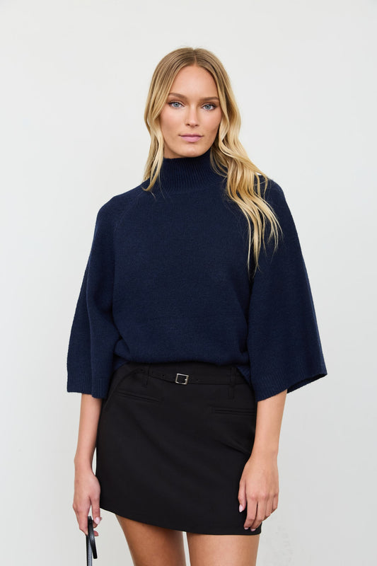 Front view of the Audrey women’s fuzzy knit mock-neck sweater in Midnight Navy