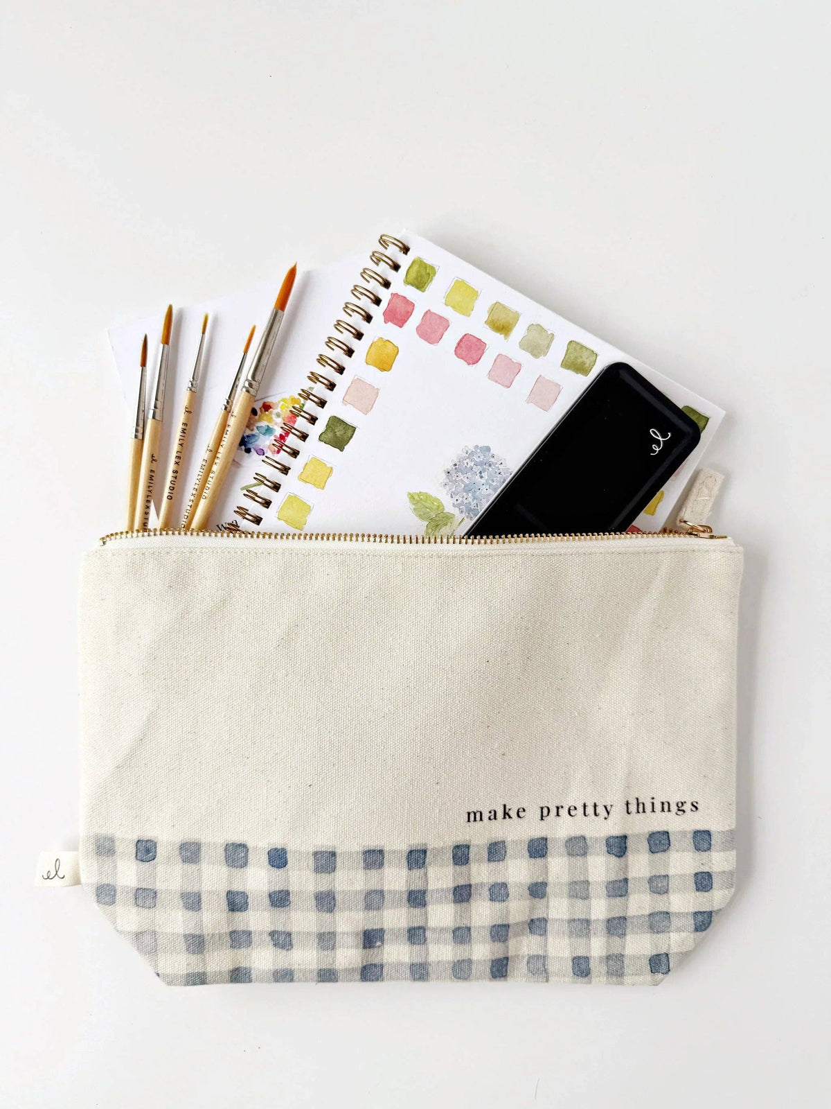 Emily Lex Studio Make Pretty Things canvas zipper pouch holding watercolor brushes and art supplies