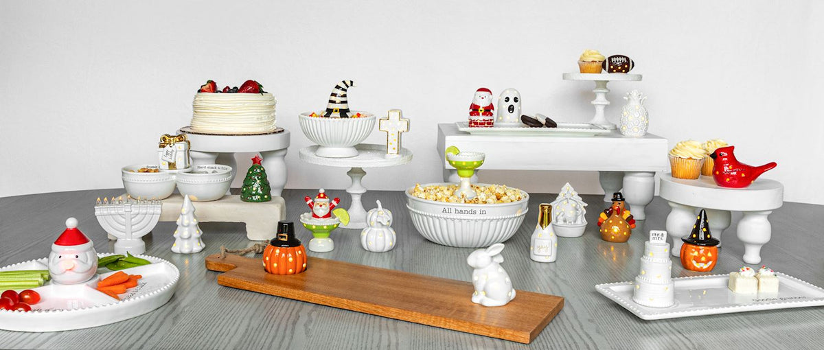 Mud Pie ceramic light-up turkey figurine glowing inside a white serving bowl for Thanksgiving entertaining