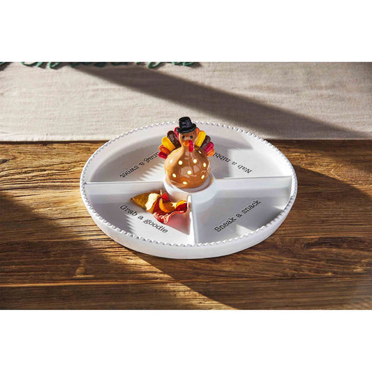Mud Pie Thanksgiving light-up turkey sitter displayed in white divided serving tray with holiday snacks