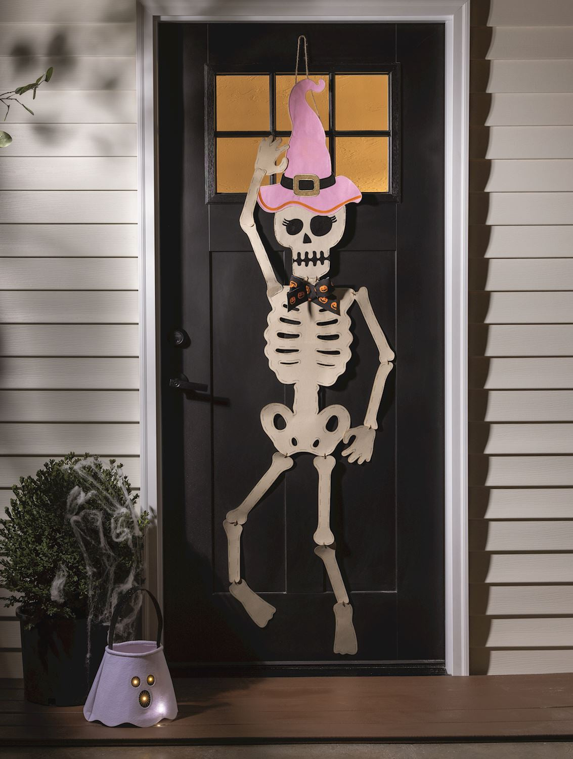 Mud Pie girl skeleton door hanger with pink witch hat Halloween decor