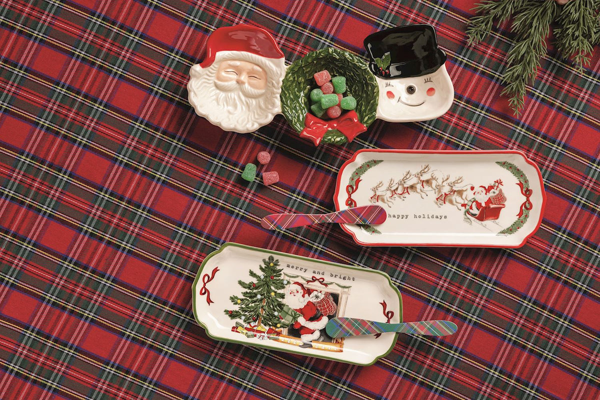 Mud Pie Christmas everything tray and spreader sets displayed with coordinating Santa and snowman serving dishes