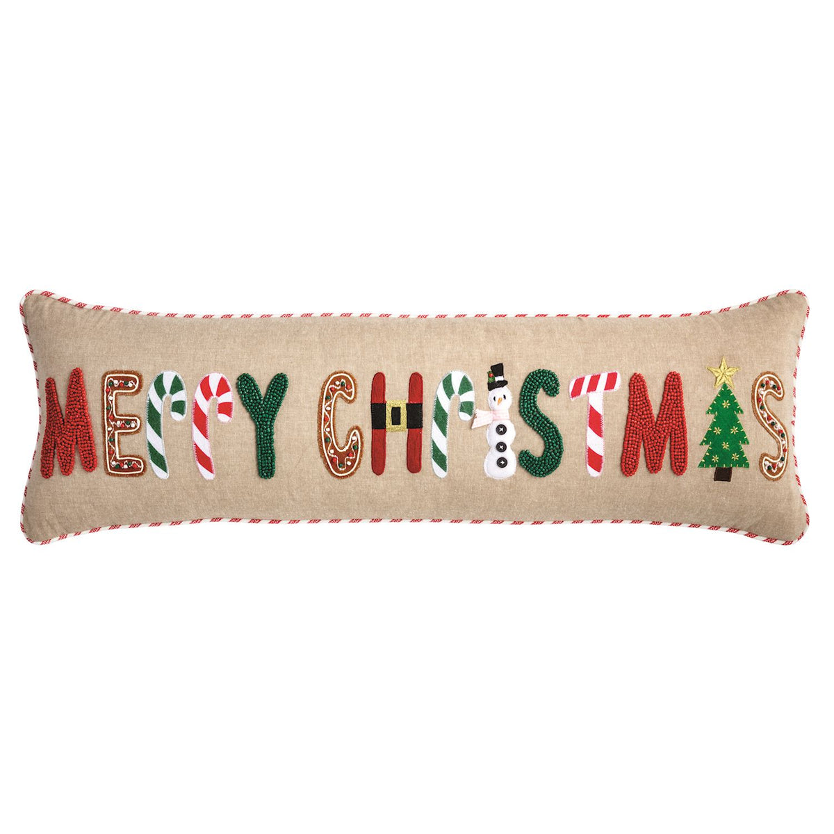 Mud Pie Merry Christmas long lumbar pillow featuring festive beaded and felt appliqué letters, natural chambray fabric, and red striped piping.