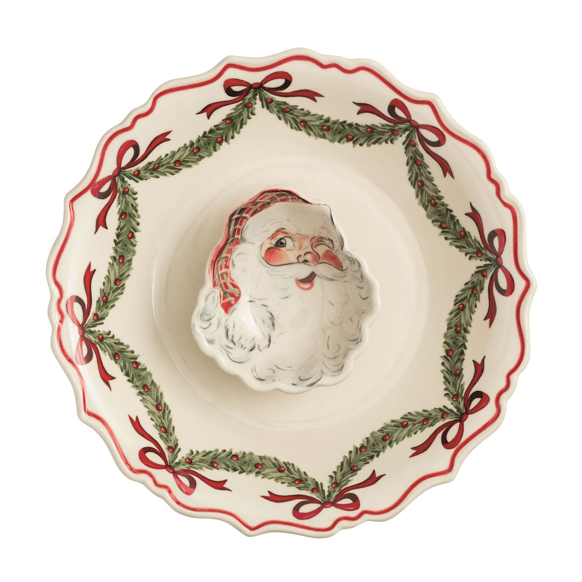 Mud Pie Santa Christmas chip and dip serving set styled with crackers on a festive red table with a green linen napkin.