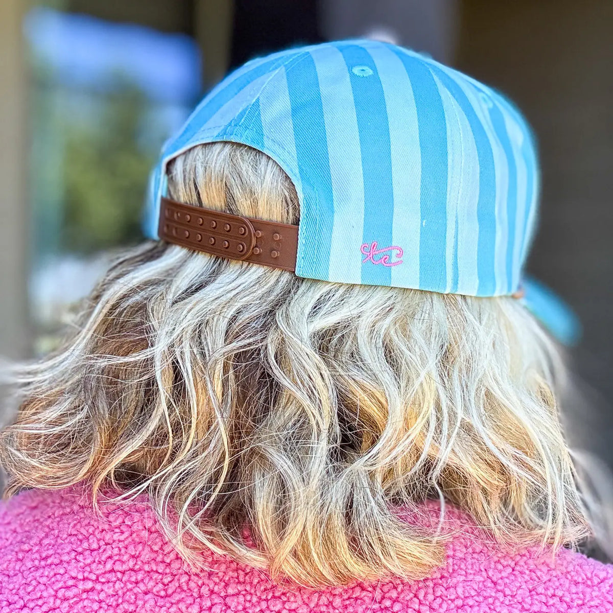Back of Mom Mode blue striped baseball cap with brown adjustable snapback