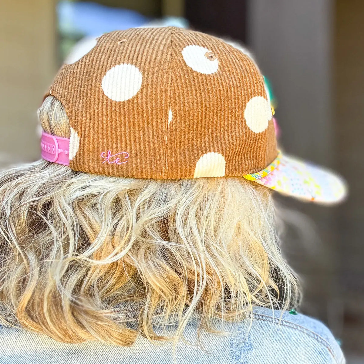 Back view of Living Proof of a Loving God tan corduroy Christian hat with pink adjustable snapback