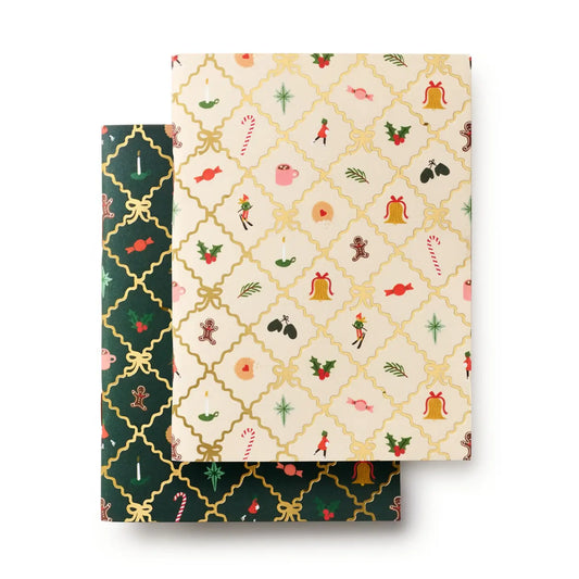 Rifle Paper Co. Holiday Argyle Pocket Notebooks in cream and evergreen Christmas designs with gold foil accents, sold individually.