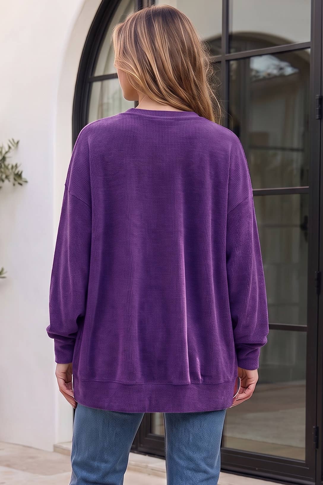 Back view of Violet Hour women’s relaxed-fit purple crewneck sweater