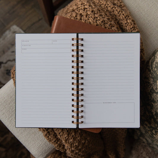 Open Green Plaid Sermon Notes Journal showing lined church notes pages with sections for speaker, date, Scripture, topic, and key takeaways.