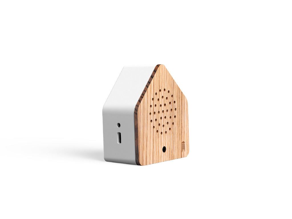 Side view of Relaxound Wind Chimes Wood Satellitebox with charging port
