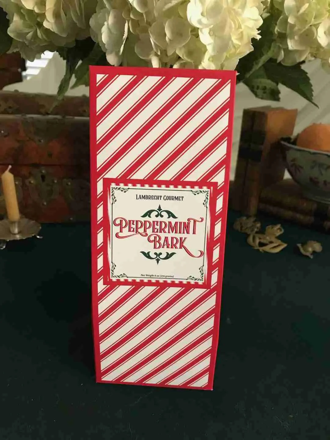 Lambrecht Gourmet Peppermint Bark in festive red and white striped Christmas gift box, handcrafted in Arkansas.