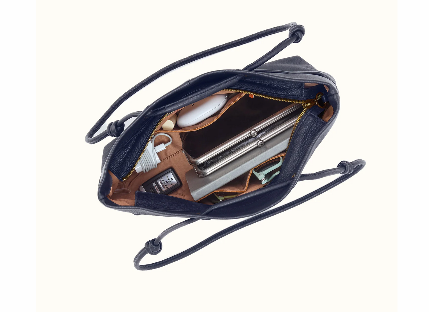 Interior of HOBO Studio Softie Ink Navy leather tote with zip and slip storage pockets