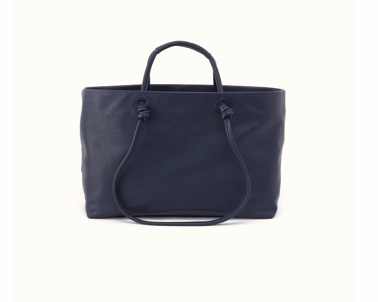 HOBO Studio Softie Ink Navy leather tote carried with convertible short handles