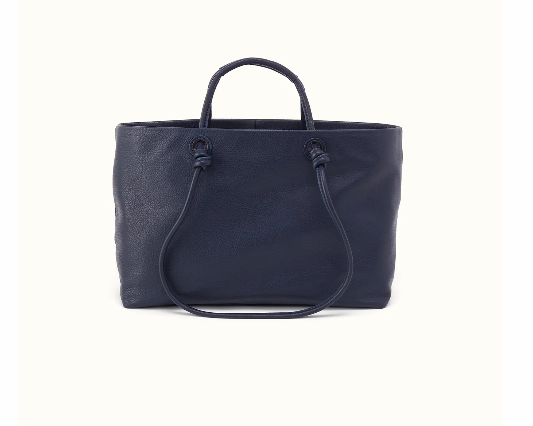 HOBO Studio Softie Ink Navy leather tote carried with convertible short handles