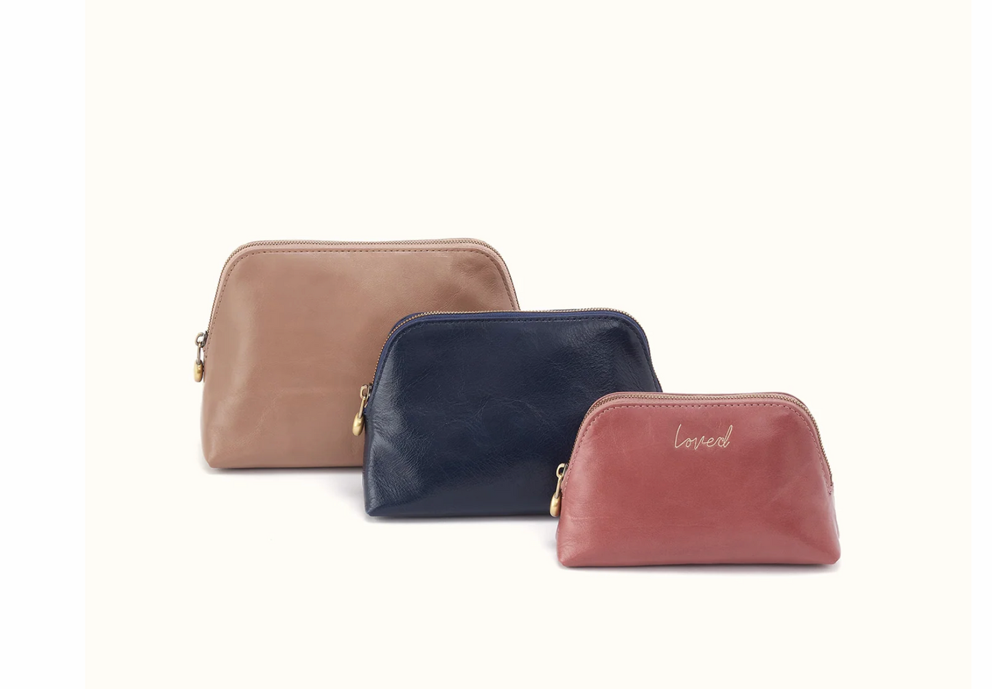 HOBO leather cosmetic pouches in Taupe Ink Navy and Rosewood sold individually
