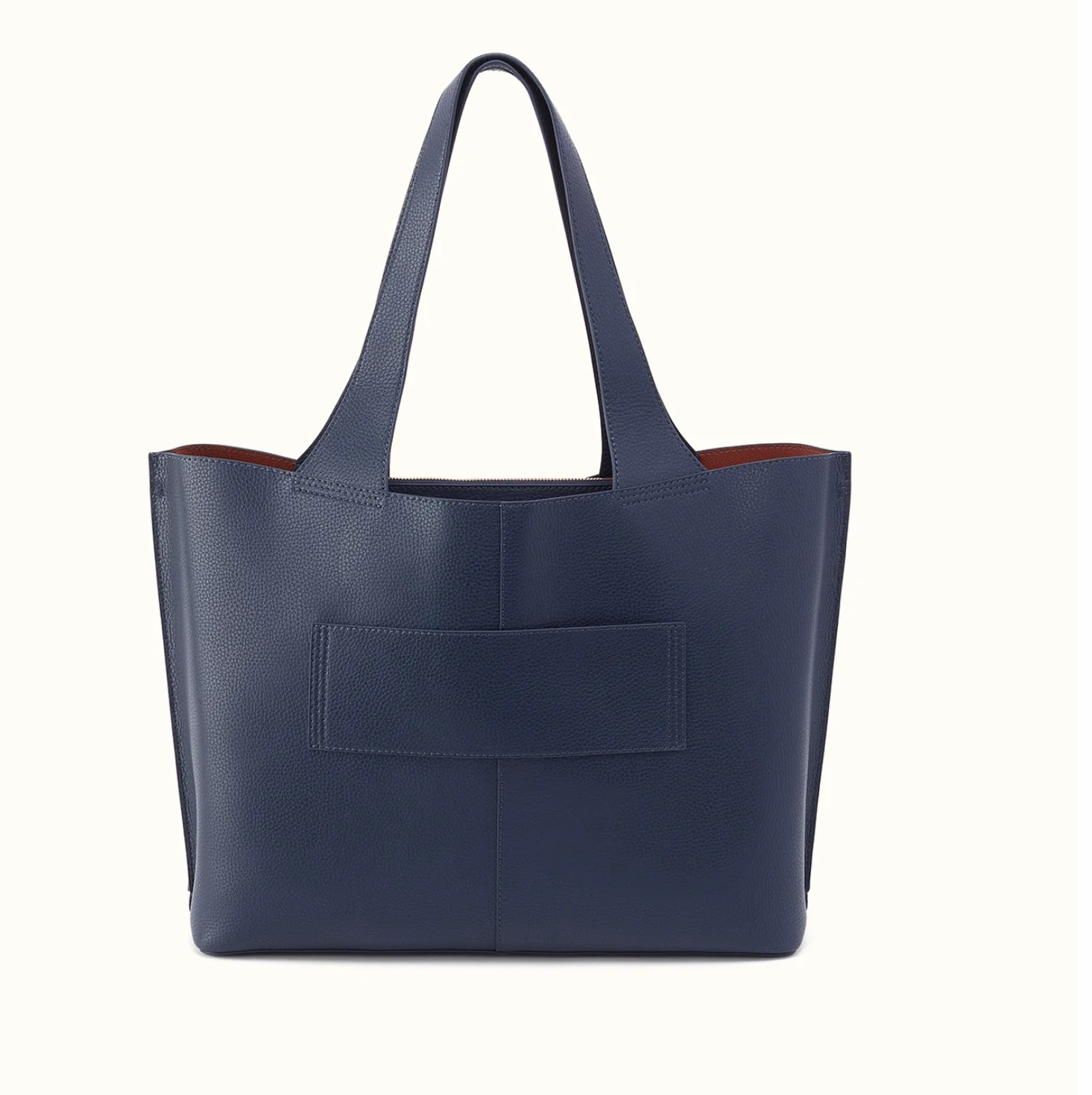 Back of HOBO Vida Large Tote in Mood Indigo with luggage trolley sleeve