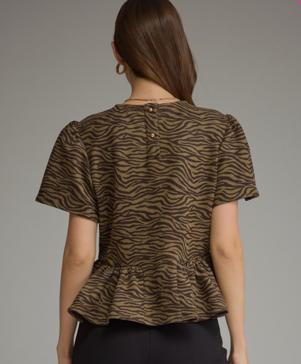 Back view of Untamed Elegance animal print top by Entro with button closure