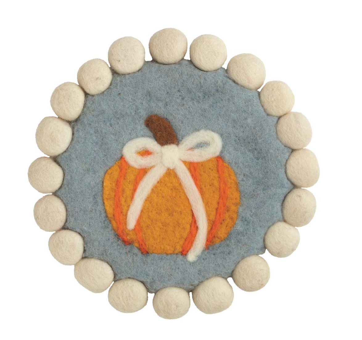Orange pumpkin felted wool trivet with cream pom-pom trim for fall kitchen and Thanksgiving table decor