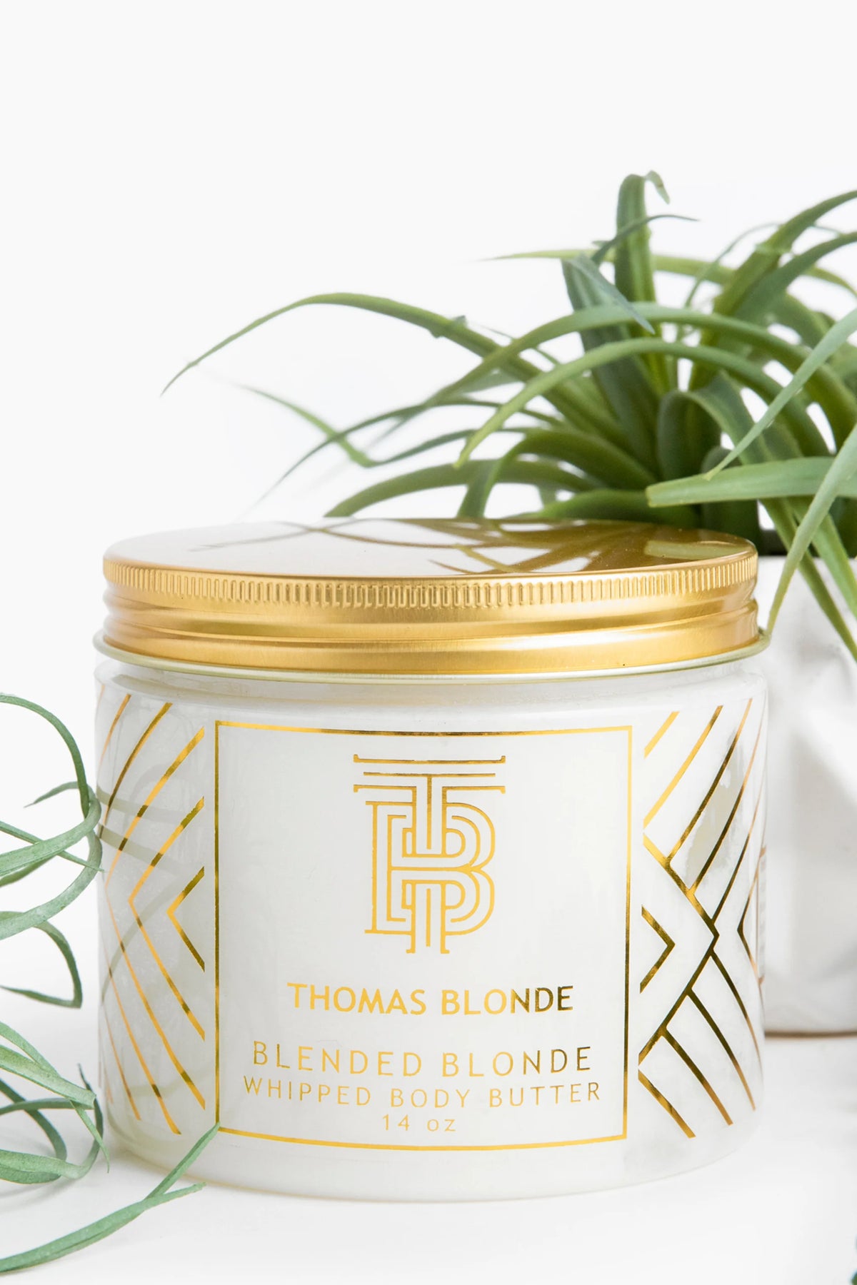 Thomas Blonde Blended Blonde Whipped Body Butter 14 oz jar with gold lid and signature gold geometric packaging.