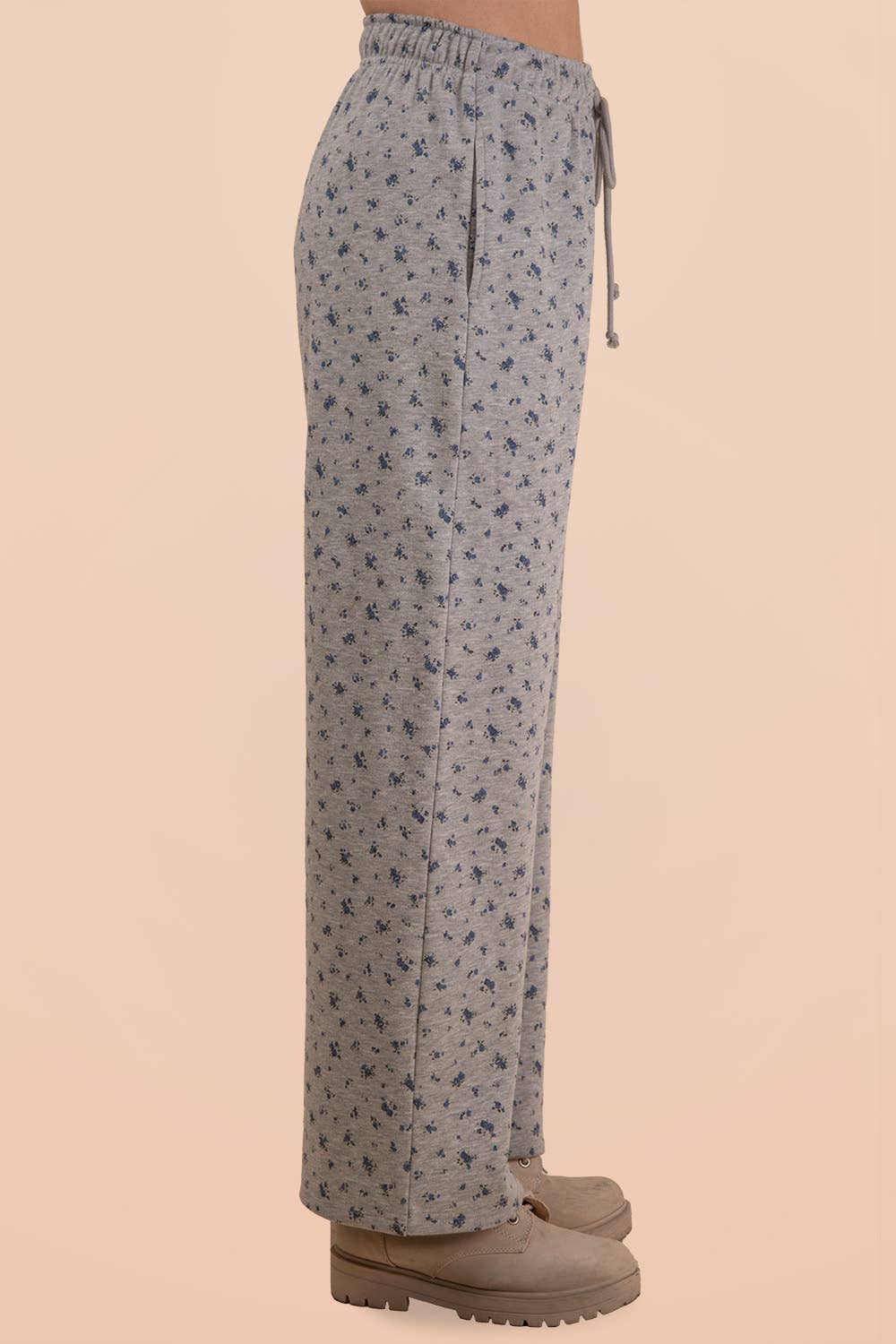 Side view of blue floral wide leg lounge pants in heather gray