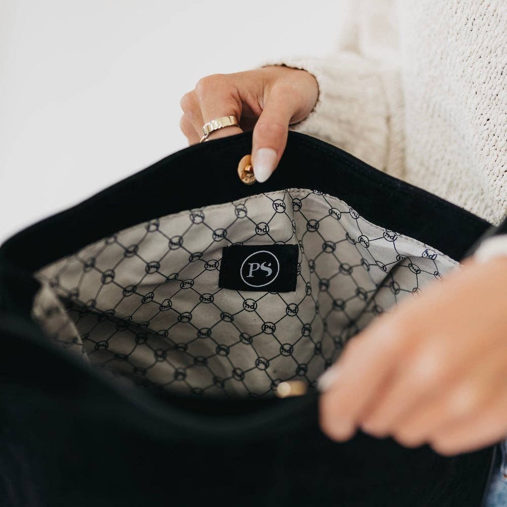 Interior pockets and lining of Evie faux suede hobo shoulder bag