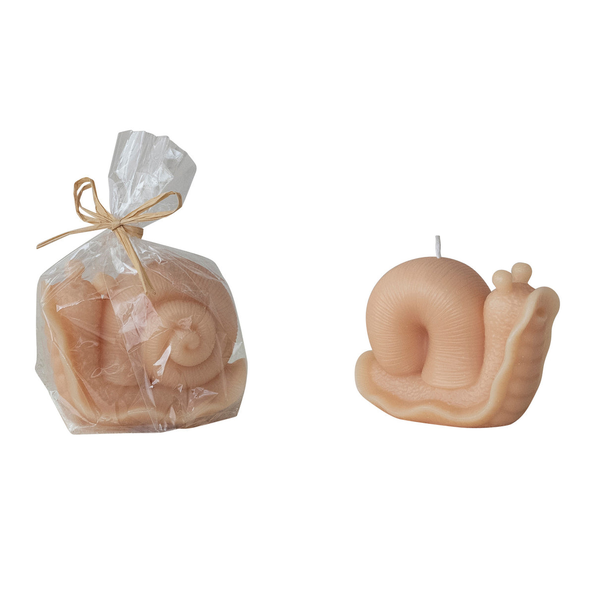 Cream snail shaped sculptural candle in cello bag with raffia tie