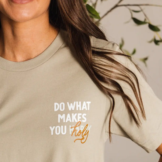 Do What Makes You Holy sage green Christian graphic tee with white and gold front lettering