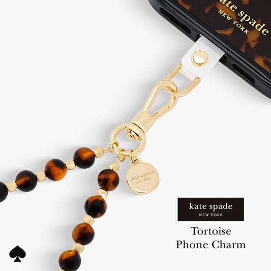 Kate Spade tortoise phone charm with gold-tone clasp and signature logo charm