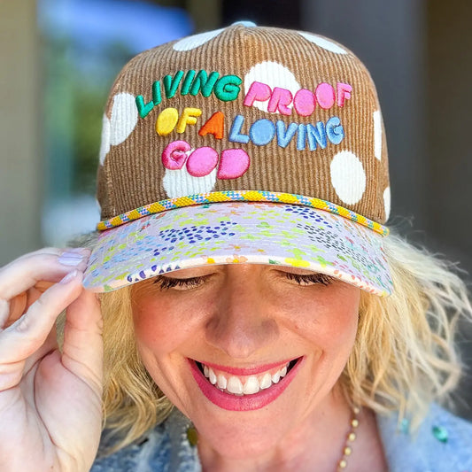 Living Proof of a Loving God Christian corduroy hat with colorful embroidery, white polka dots and floral bill
