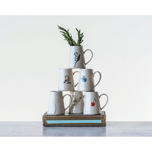 Six mini hand-painted stoneware creamers with floral fruit and bird designs
