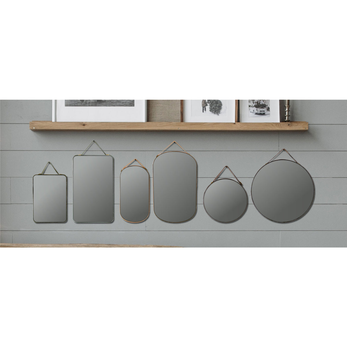 Six velvet framed mini wall mirrors in round oval and rectangle shapes
