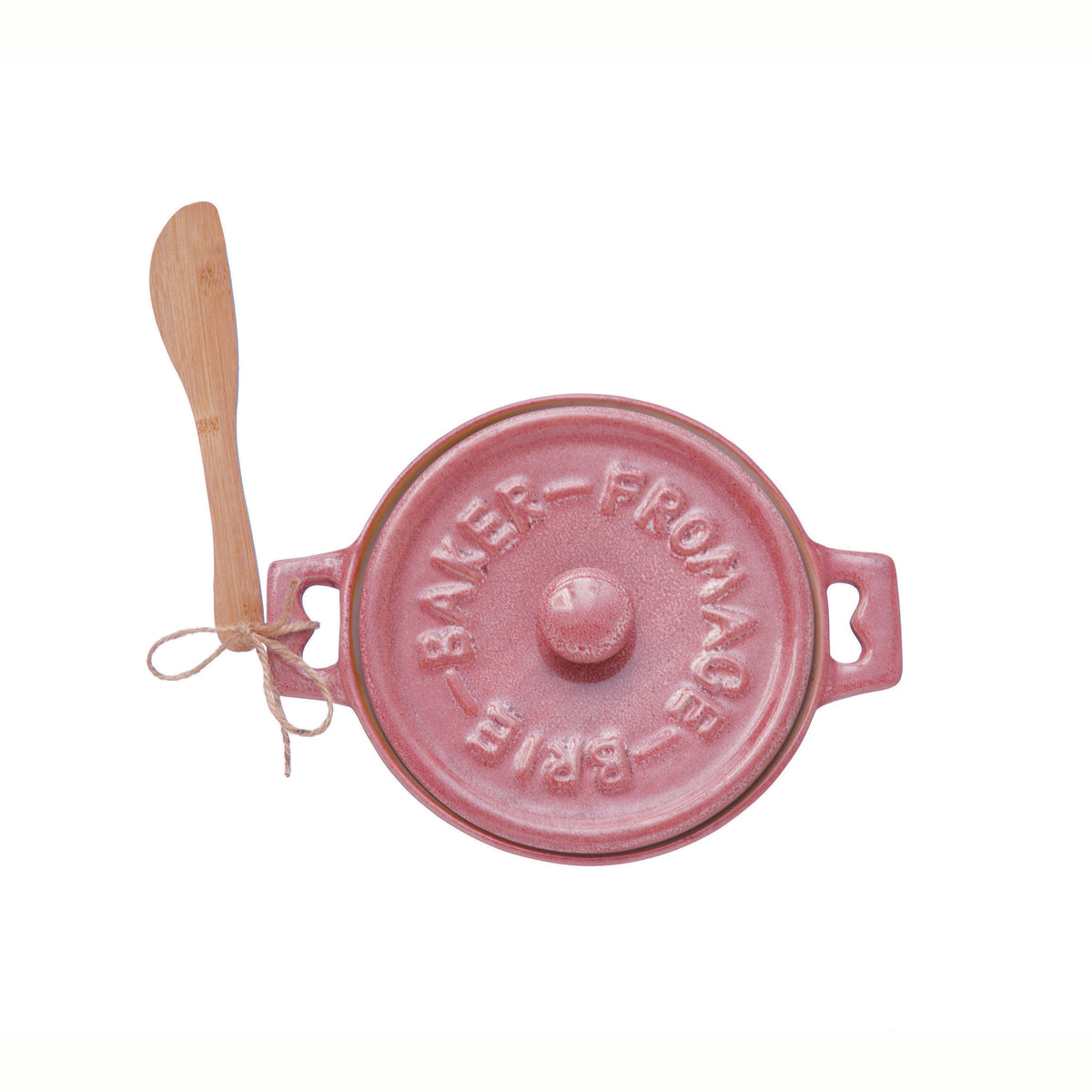 Pink stoneware brie baker with bamboo spreader styled with baked brie and serving plate
