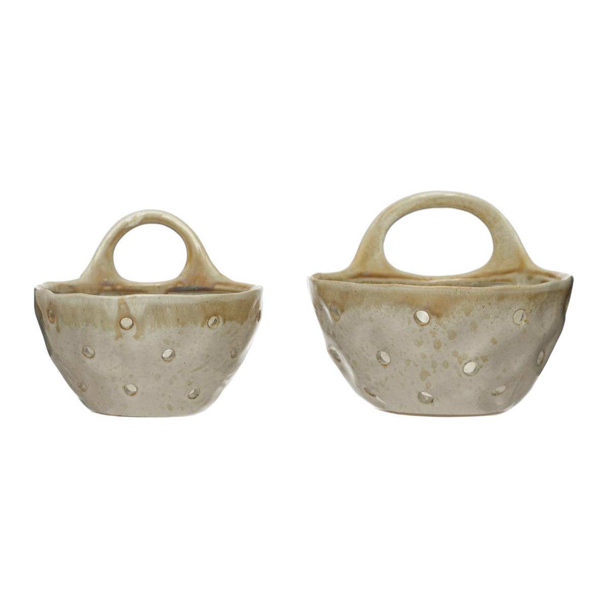 Beige stoneware berry colanders with handles and reactive glaze in small and large sizes
