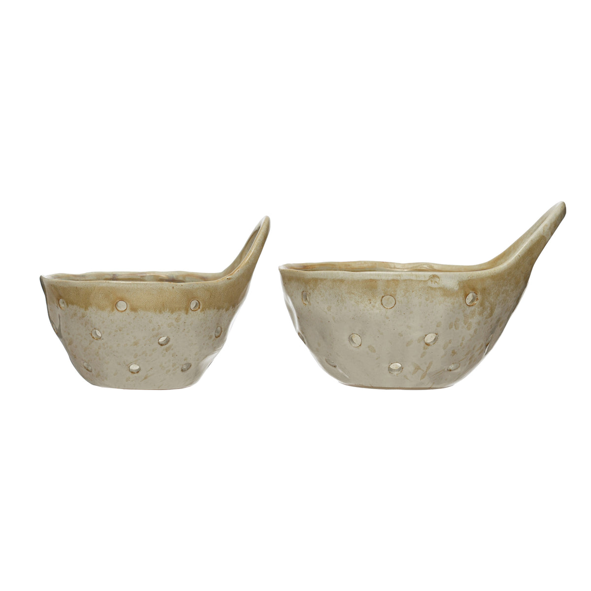 Beige stoneware berry colanders with handles and reactive glaze in small and large sizes
