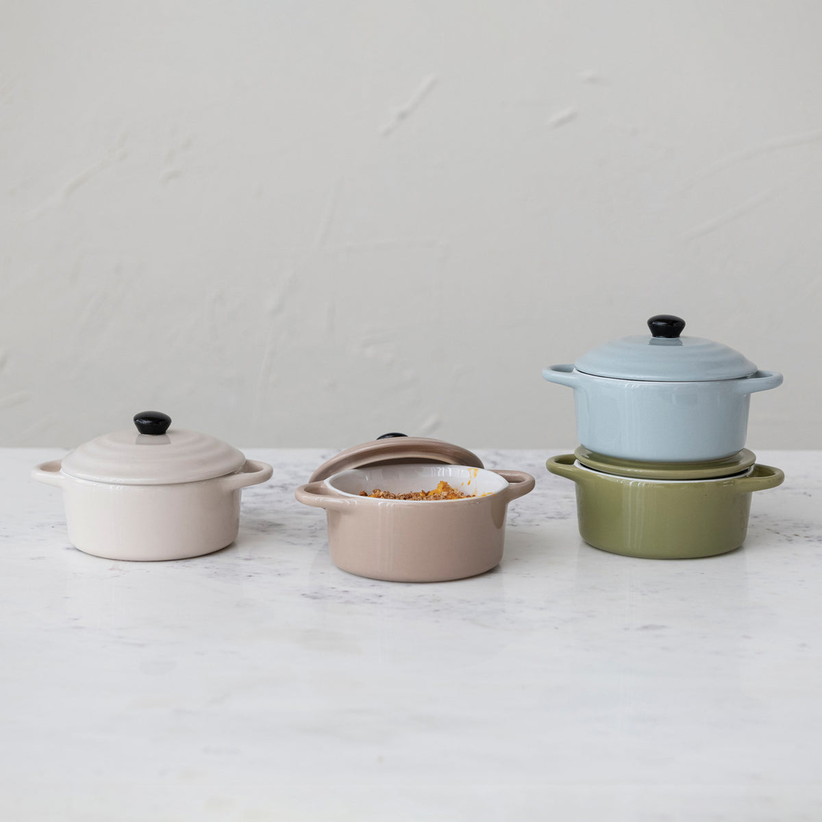 Covered stoneware mini bakers in cream mocha sage green and powder blue