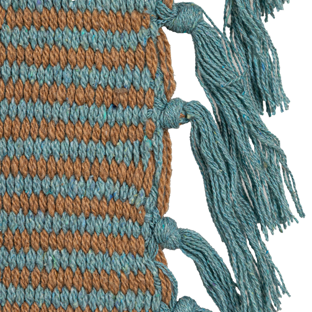 Close-up of Blue Ridge striped woven throw blanket with blue fringe and textured weave
